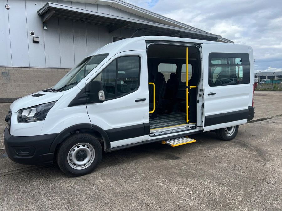 Ford Transit minibus side veiw with open door