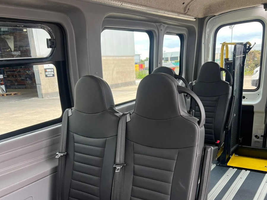 Ford 9seat accessible wheelchair seats with grab handle seats and cant rails