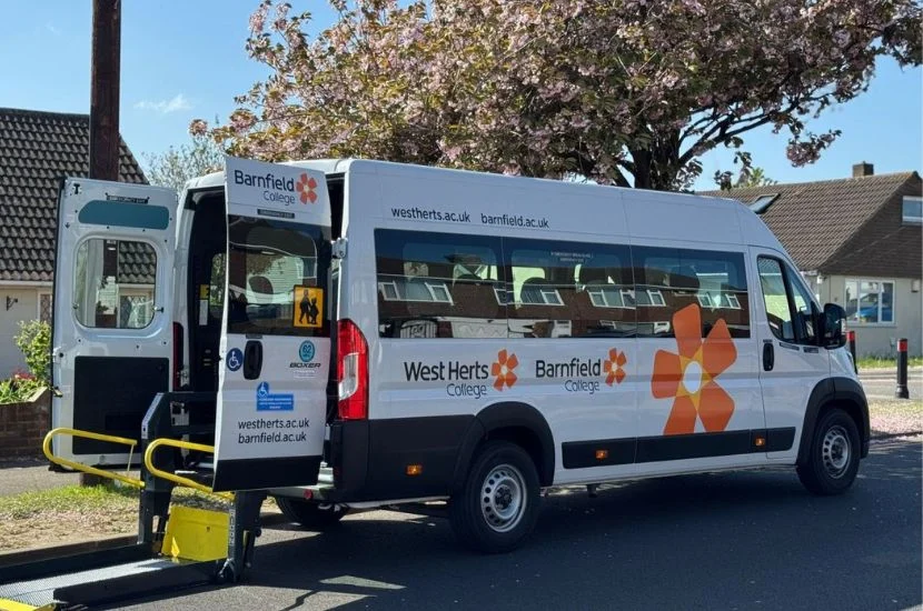 Standard logo and livery on white WAV minibus
