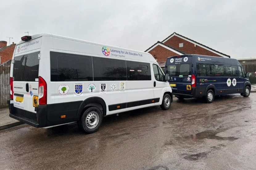 Standard logo and livery on white minibus